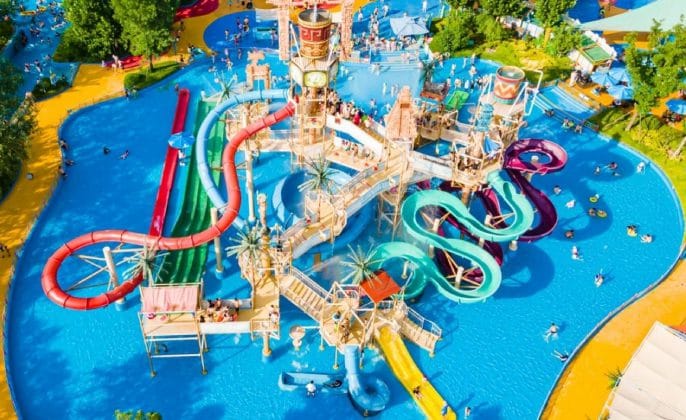 destination water park with wave pool and slides